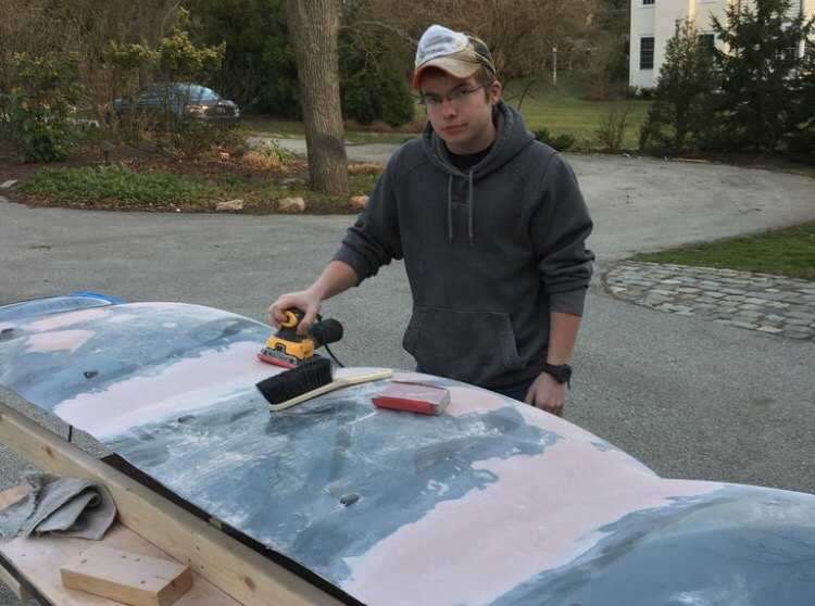 Devin shaping the hood during his internship.