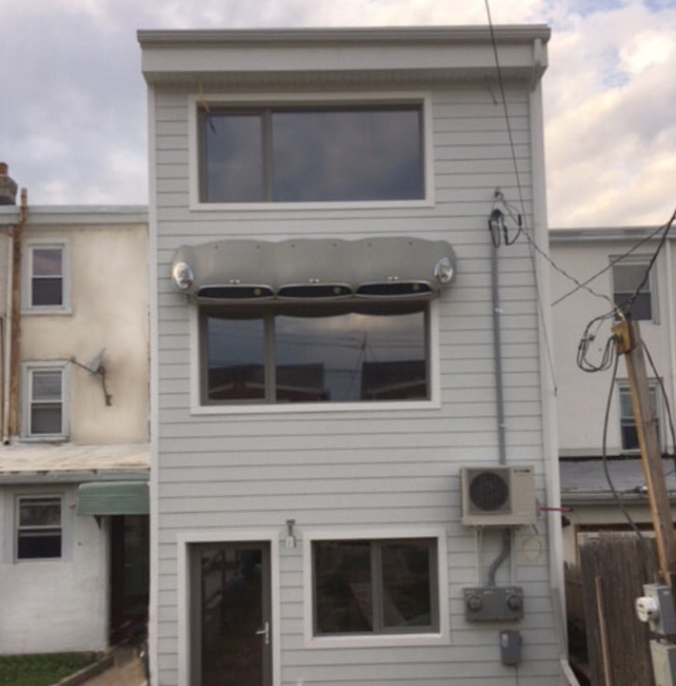 The awning in place, before we gussied up the backyard.